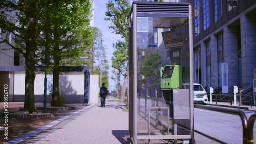 City,Office District,Telephone Booth,Public Phone,Sidewalk,Street Trees,Sunlight