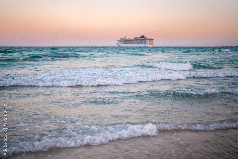 Cruise ship on the ocean. Luxury liner at sunset. Miami Beach with cruise ship. Turquoise water and cruise liner. Tourist cruise ship near the coast. Ocean waves and vessel boat. Cruise ship on the ocean. Luxury liner at sunset. Miami Beach with cruise ship. Turquoise water and cruise liner. Tourist cruise ship near the coast. Ocean waves and vessel boat.
