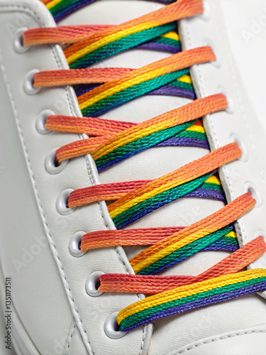 Colorful Rainbow Shoelaces on White Sneakers Perfect for Celebrations and Events