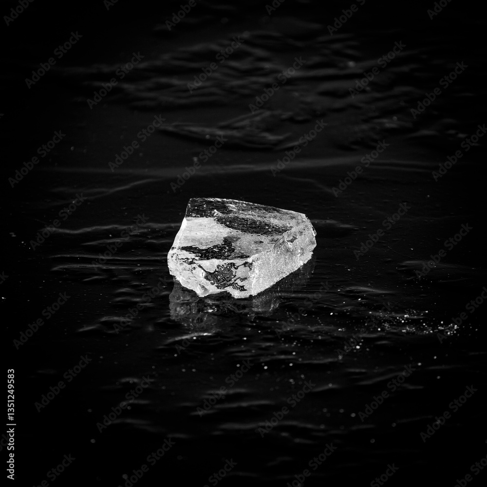 Piece of ice on a frozen surface