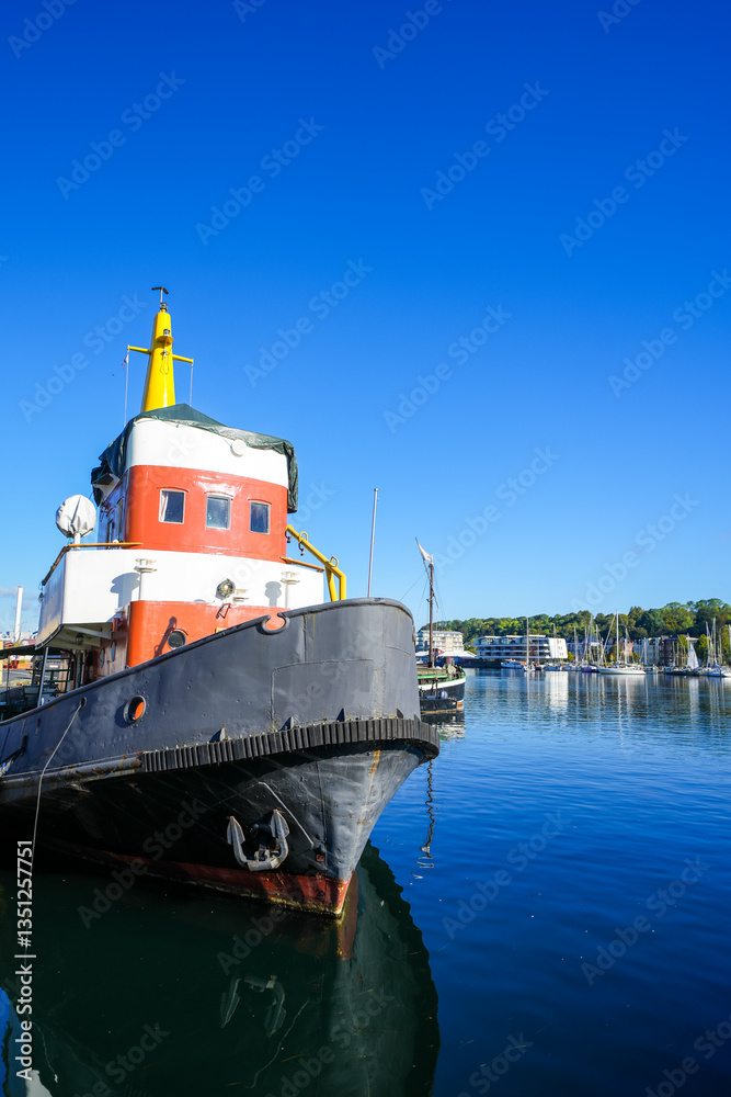 Fototapeta premium View of the historic harbor of the city of Flensburg and the surrounding landscape. Flensburg harbor on the fjord. 
