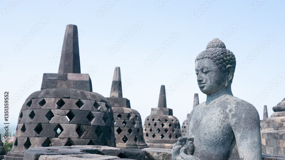 Fototapeta premium Buddha and Stupa at Borobudur temple