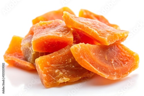 A dried papaya piece on a white background