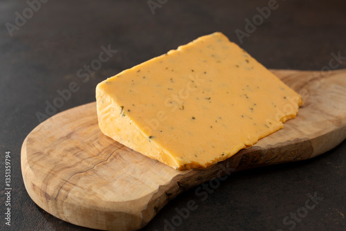 Cuadro en lienzo A view of a block of double gloucester cheese.