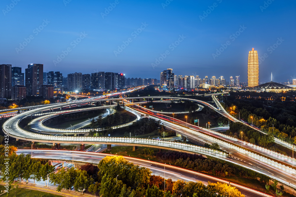Fototapeta premium Night view of CBD and overpass in Zhengdong New District, Zhengzhou, Henan, China