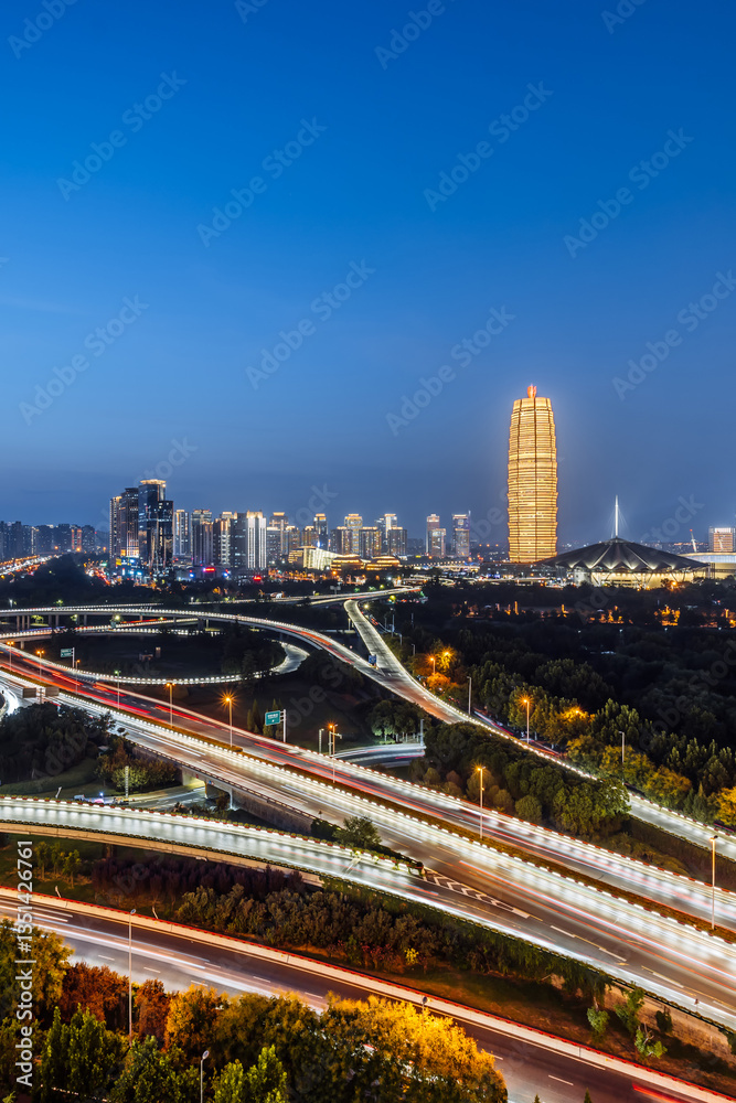 Obraz premium Night view of CBD and overpass in Zhengdong New District, Zhengzhou, Henan, China