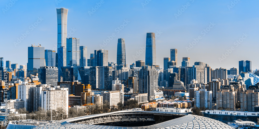 Fototapeta premium New Workers Stadium and CBD skyline in Beijing, China