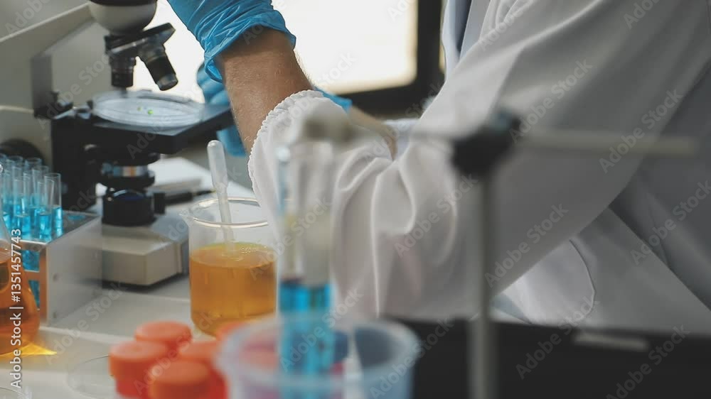 laboratory research and development concept with lab glassware and female scientist