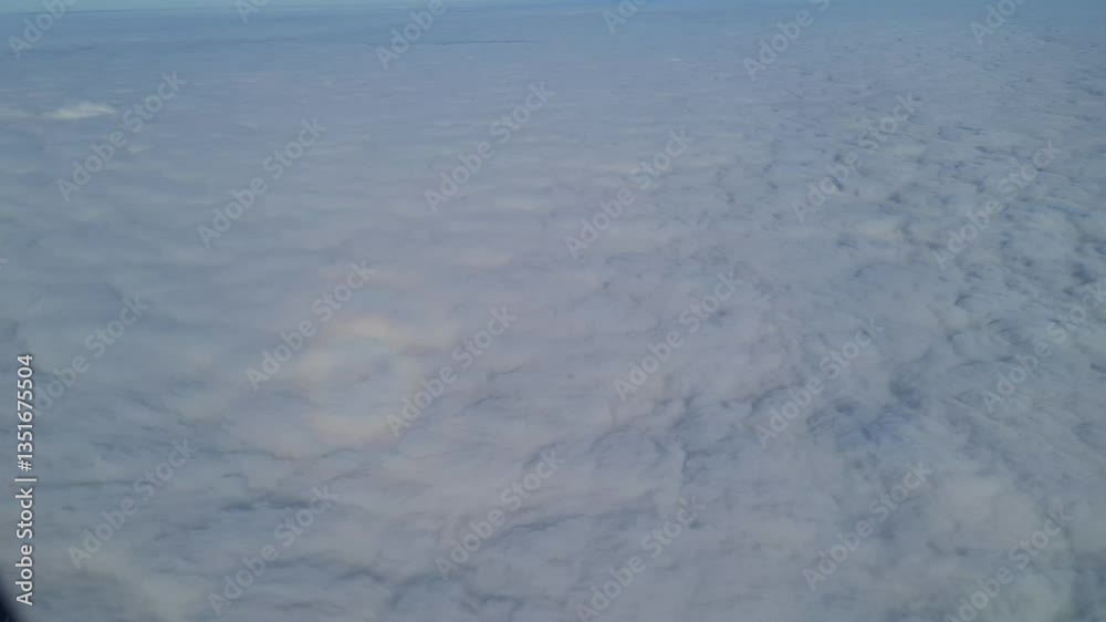 Aerial View of Sky and Clouds From Airplane's Window From High Altitude During Travel From London Luton to Scotland UK. June 5th, 2024 Aerial View of Sky and Clouds From Airplane's Window From High Altitude During Travel From London Luton to Scotland UK. June 5th, 2024