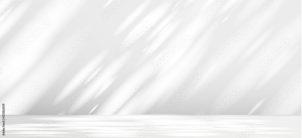 Obraz premium Glare from the sun's rays on the wall. Blurred shadows from leaves and plants in the room. Soft overlay of natural light. Abstract background for product presentation.Natural light layout.