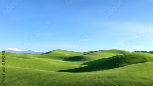 Rolling green hills under a clear blue sky, idyllic landscape perfect for travel brochures or website backgrounds