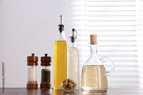 Wallpaper Mural Salad dressings, spices and olives on table in kitchen Torontodigital.ca