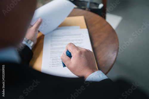 Businessman stamping an official document. Concept of approval, certification, contract signing, and legal authorization. Perfect for business, finance, law, and corporate identity visuals.
