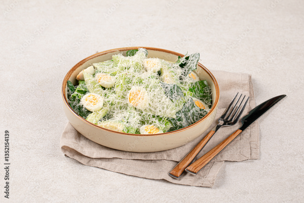Portion of healthy avocado green salad with eggs