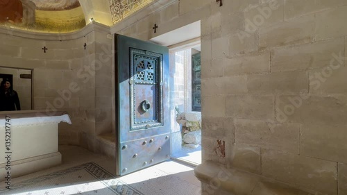 Mount Tabor. A half-open iron door of the Basilica of the Transfiguration on Mount Tabor.