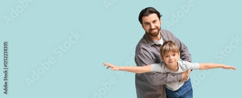 Portrait of happy dad and s...