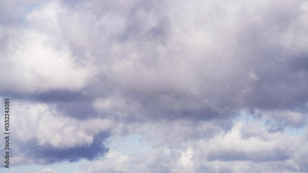 Timelapse of white clouds forming and merging in bright blue sky, showcasing the celestial beauty Timelapse of white clouds forming and merging in bright blue sky, showcasing the celestial beauty