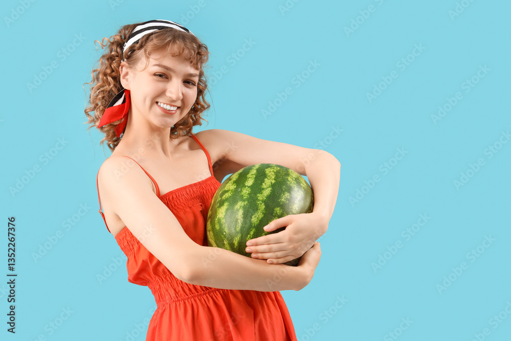 Happy beautiful young woman with ripe watermelon on blue background Happy beautiful young woman with ripe watermelon on blue background