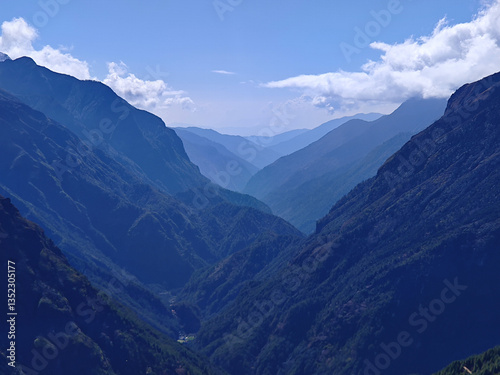 Deep blue mountain valley layers