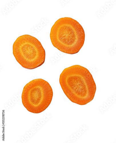 This close-up image captures a pile of finely grated carrots next to a metal grater, highlighting the texture and vivid color on a smooth white background.