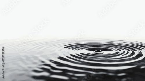 A high-contrast, monochrome close-up photograph depicting the concentric ripple effect created by a water droplet impacting a smooth water surface. The image is primarily composed of grayscale