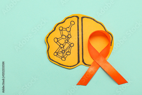Paper brain and orange ribb...