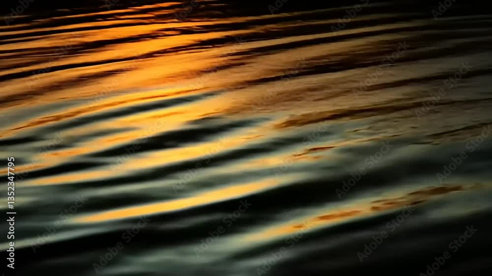 Serene sunset reflections on calm water surface, creating ripples and a tranquil atmosphere Serene sunset reflections on calm water surface, creating ripples and a tranquil atmosphere