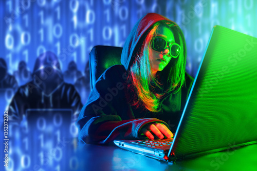 Hacker woman with laptop. C...