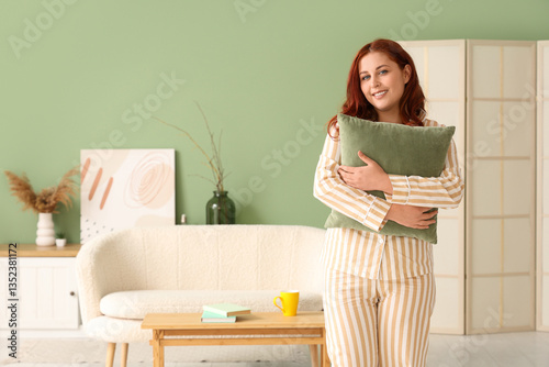 Smiling young woman in stri...