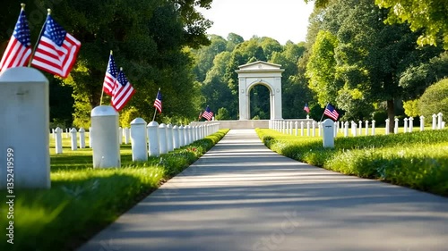 A tranquil national cemetery featuring rows of white headstones and a majestic memorial arch.