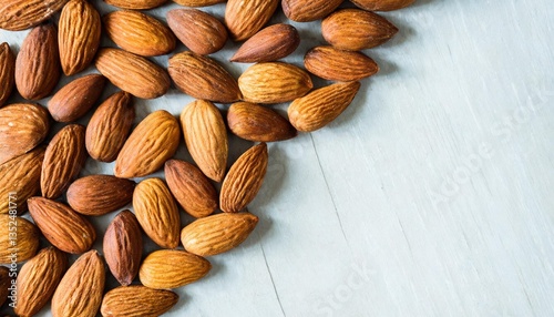 Creative layout made of almond nuts. Flat lay. Food concept. Almond pattern concept.