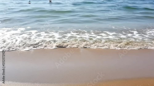 Sea waves on the beach, realistic style, in shades of blue and beige, representing summer vacation