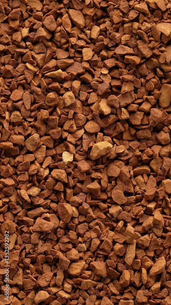 Freeze dried coffee powder kept on rotating disc. Close up of Arabica coffee powder. Freeze dried coffee powder kept on rotating disc. Close up of Arabica coffee powder.