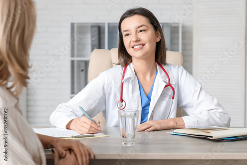 Female doctor working with ...