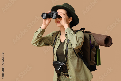 Young female tourist lookin...