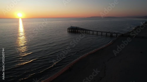 Wallpaper Mural Aerial video documentation of the Lido di Camaiore pier at sunset Torontodigital.ca