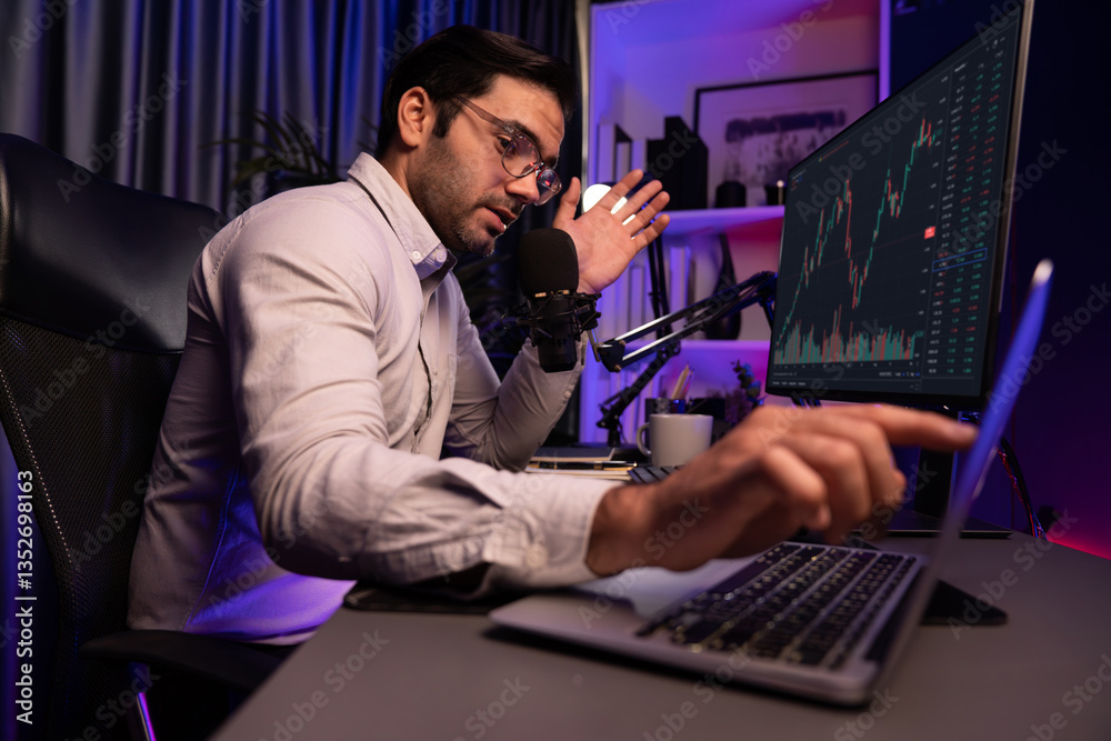 Smart trader businessman concentrating on dynamic stock exchange investment on pc and laptop showing on screen with high profit in searching market at neon light office in dark room night. Surmise.