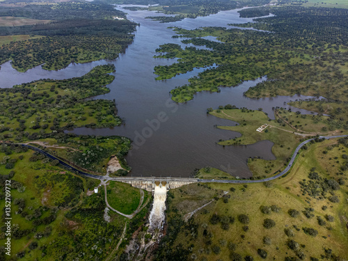 Monte Novo Dam at its maximum water level, supplying Évora, Alentejo, Portugal. A serene landscape reflecting the abundance of water in the region.