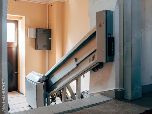 The lifting platform for stairs allows people with disabilities and people with limited mobility to move along multi-level staircases