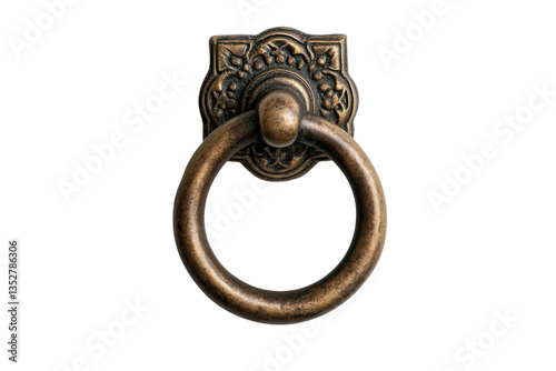 Antique brass door knocker with ornate design on black background, cut out