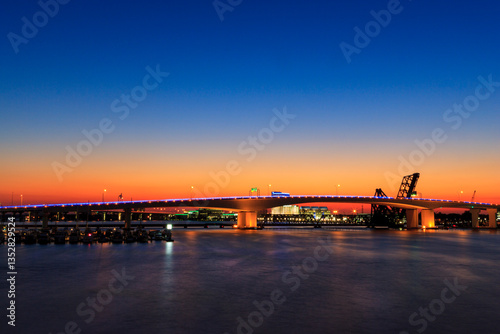 The Acosta Bridge and Jacksonville Skyline at sunset along the St Johns River in North Florida