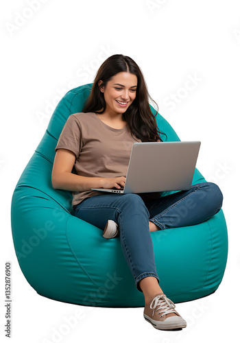 A young woman sits in a bag chair, working on her laptop and smiling
