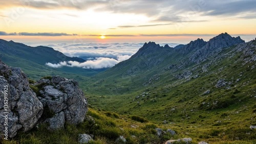 Sunrise over Majestic Mountains and Clouds
