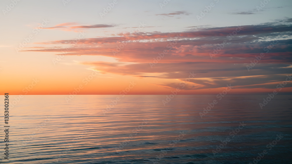 Obraz premium Sunset over a calm ocean