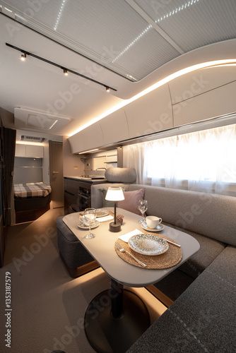 Obraz na plátne ANKARA,TR-AUGUST 20,2024:Interior with,tables,refrigerator,kitchen corners,ceiling ligthning,couches,living space in modern Adria Alpina 583 LP