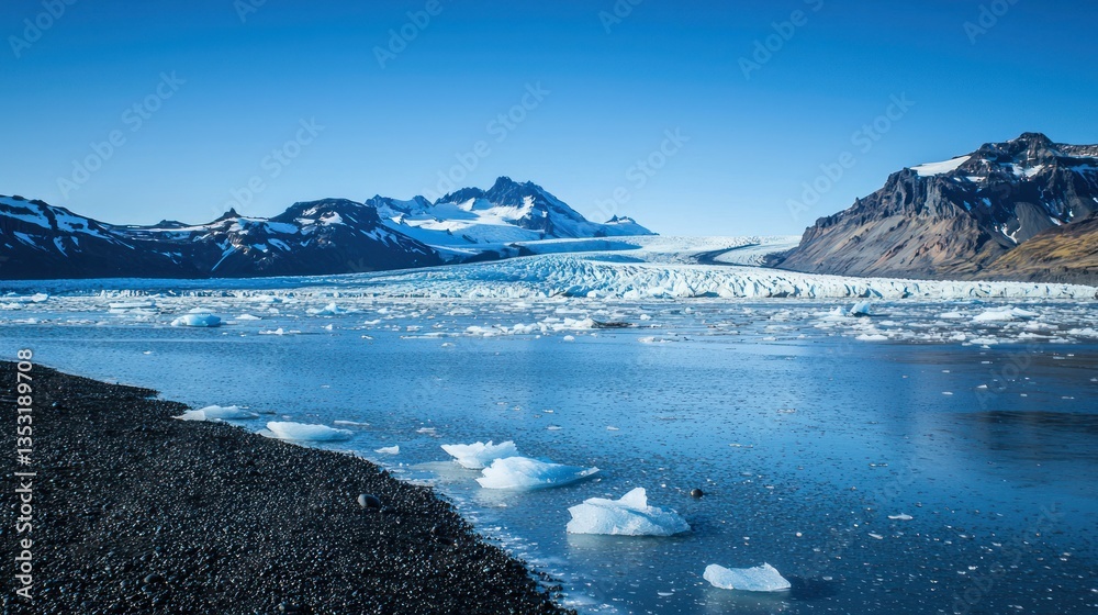 A breathtaking view of ice-covered mountains under a clear blue sky.
