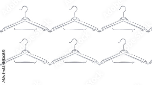 The image shows twelve slimline clothes hangers arranged in four rows of three on a white background. The hangers are light-grey or silver, with a slight sheen, suggesting a plastic or coated metal