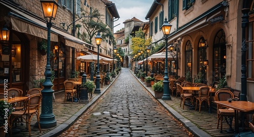Vintage cobblestone street lined with oldfashioned lampposts and quaint cafes