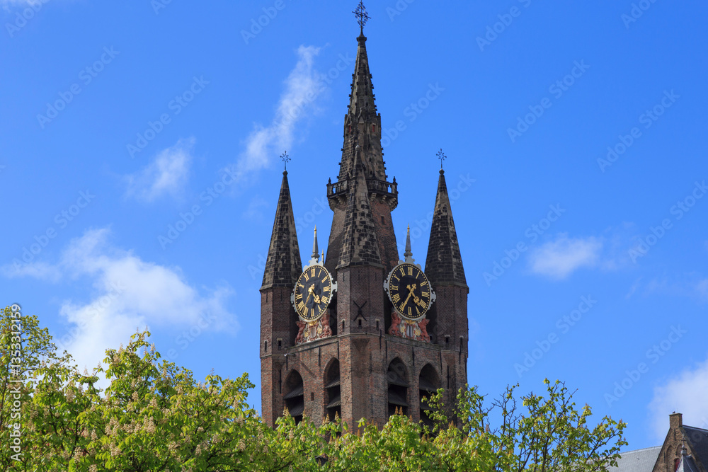 Europe, Netherlands, South Holland, Delft. Oude Kerk, Old Church. steeple and clock tower.