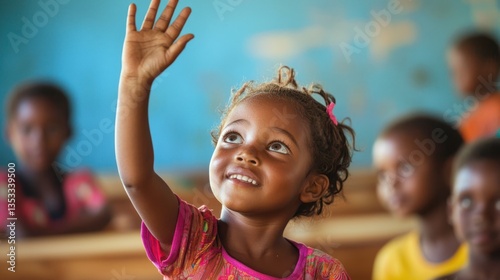 Obraz na płótnie A child with their hand in the air, excited to answer a question in class w salonie